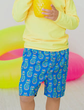 Load image into Gallery viewer, Rufflebutts Boys Neon Blue Pineapples Swim Trunks